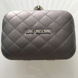 Love Moschino silver clutch.